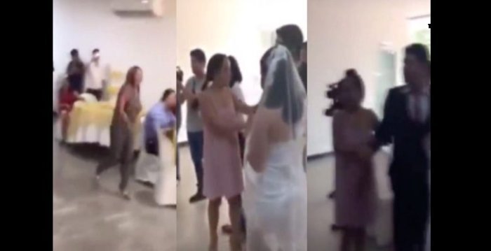 Umugore yinjiye mu bukwe avuza induru akubita umugeni 