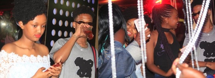 Mu mafoto 50&nbsp;: Abakobwa benshi bateje umuvundo barwanira kwinjira mu modoka ya Nasty C 